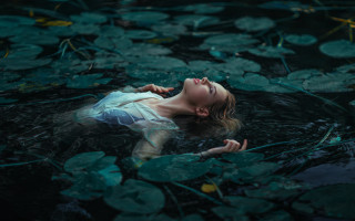 Woman floating lily pads water - lily pad free wallpaper
