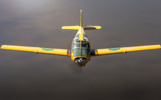 Yellow blue plane water sun - plane free wallpaper