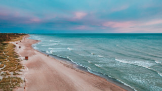 Beach sandy shore blue sky - a sandy shore free wallpaper