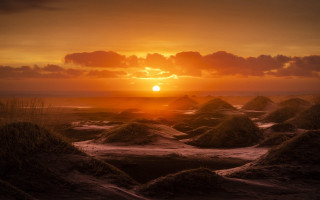 Sunset field sand mounds grass - a sunset over a field free wallpaper