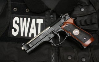 Swat vest gun patch badge - a gun free wallpaper for desktop