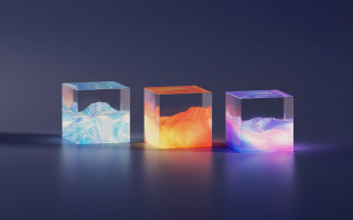 Three colored cubes hologram volumetric - a blue background behind them free wallpaper