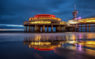 Pier tower clocknight lights water - colijn de coter free wallpaper