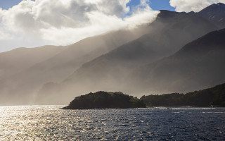 Mountain reflection boat ocean sky - dave kendall free wallpaper for desktop