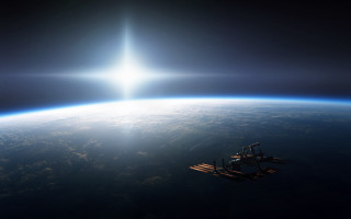 Space station earth sunlight beam 2 - a space station in the middle of the earth free wallpaper
