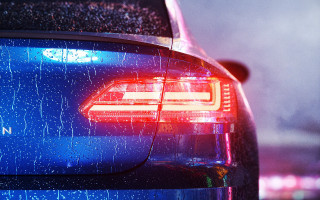 Blue car tail light rain - drop free wallpaper