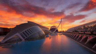 Large building pool sunset reflection - a pool in front free wallpaper
