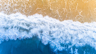 Wave breaking blue yellow white - a yellow stripe free wallpaper