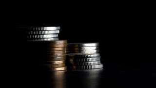 Coins stack macro shallow light - top of a table next free wallpaper