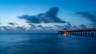 Pier lighthouse night clouds water - a light house free wallpaper