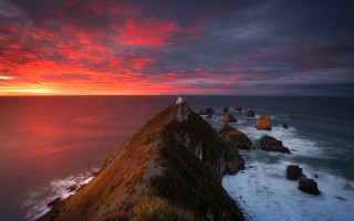 Lighthouse cliff ocean sunset red 2 - a few wave free wallpaper for desktop