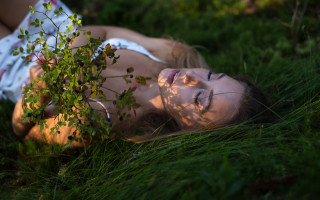 Woman lying grass plant closed - a plant free wallpaper for desktop
