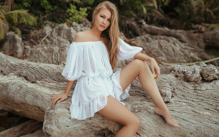 Woman white dress beach sitting - fashion photoshoot free wallpaper