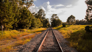 Train grass trees clouds autumn - a train track free wallpaper