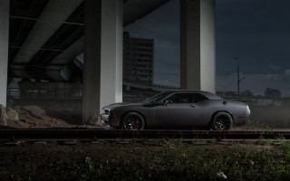 Car traintrack bridge night headlights - under a bridge free wallpaper