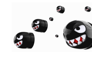 Flying balls faces sharp teeth - a group of balls free wallpaper
