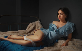 Woman blue dress bed room - hyperrealistic free wallpaper