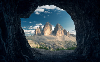 Cave mountain range sky clouds - a cave free wallpaper