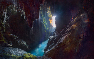 Cave river person outdoor fantasy - a cave free wallpaper