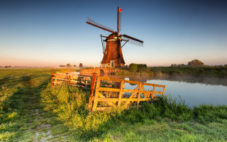 Windmill greenfield river landscape forest - a windmill free wallpaper