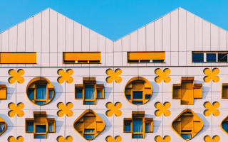 Modernist building yellow windows white - bold shape free wallpaper