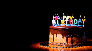 Birthday cake lit candles dark 4 - a birthday cake free wallpaper