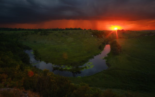 Sunset river grassy field trees 2 - a sunset over a river free wallpaper