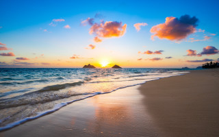 Beach waves sunset island clouds - a small island in the distance free wallpaper