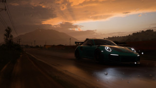 Green sports car night mountains - a green sports car free wallpaper