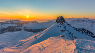 Mountain sunset snow lake city - the ground below free wallpaper