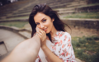 Romantic portrait woman holding hand - step free wallpaper