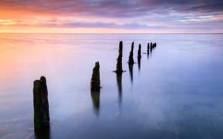 Wooden posts water sunset cloudy - wooden post free wallpaper