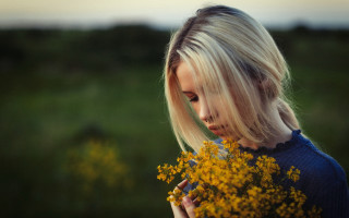 Woman yellowflowers serious blonde cinematic - artur tarnowski free wallpaper