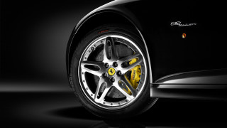 Car tire closeup black background - the car free wallpaper