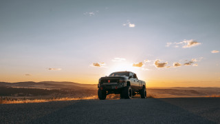 Sunset truck beach mountains ocean - octane free wallpaper