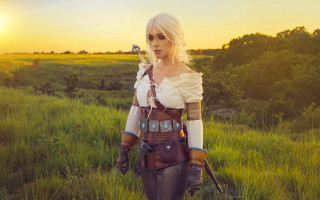 Woman cosplay archer field sunset - a bow and arrow free wallpaper