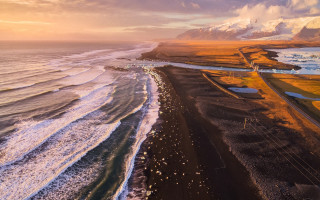 Beach mountain water train landscape - a mountain in the background and a body of water free wallpaper