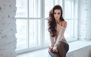 Woman sitting window sill brick - long dark hair free wallpaper