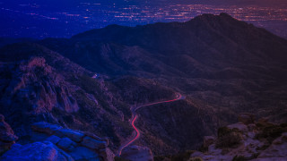 Mountain road night city lights 2 - mountainous free wallpaper