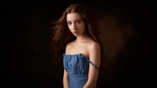 Woman blue dress wind blown - a picture in the dark free wallpaper