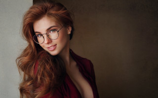Woman glasses blowing hair portrait - glass free wallpaper for desktop