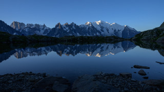 Mountain range reflection lake dusk - widescreen free wallpaper