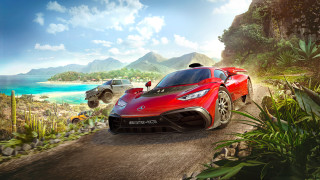 Red sports car beach mountains - a dirt road next free wallpaper