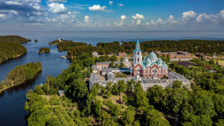 Blue roof building lake forest - tree and water free wallpaper