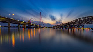 Bridge night lights reflection clouds - long exposure free wallpaper