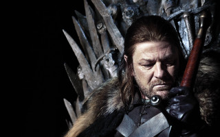 Man suit armor holding gun - his hand and a sword free wallpaper