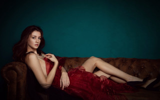 Woman red dress couch fashion - claire dalby free wallpaper