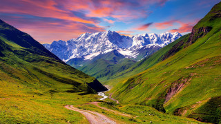 Dirt road valley mountains stream - the background and a stream free wallpaper