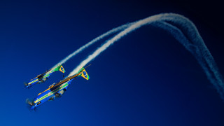 Airplanes sky smoke trails blue - behind them free wallpaper