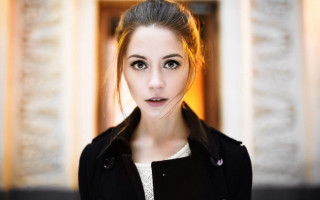 Woman black coat white shirt - perfect face free wallpaper